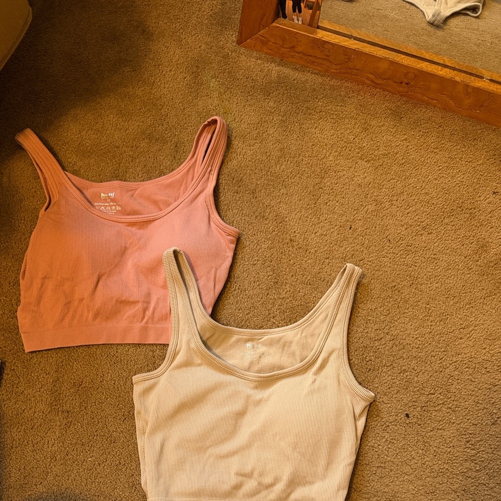Women's two pack tank top with build in bra.